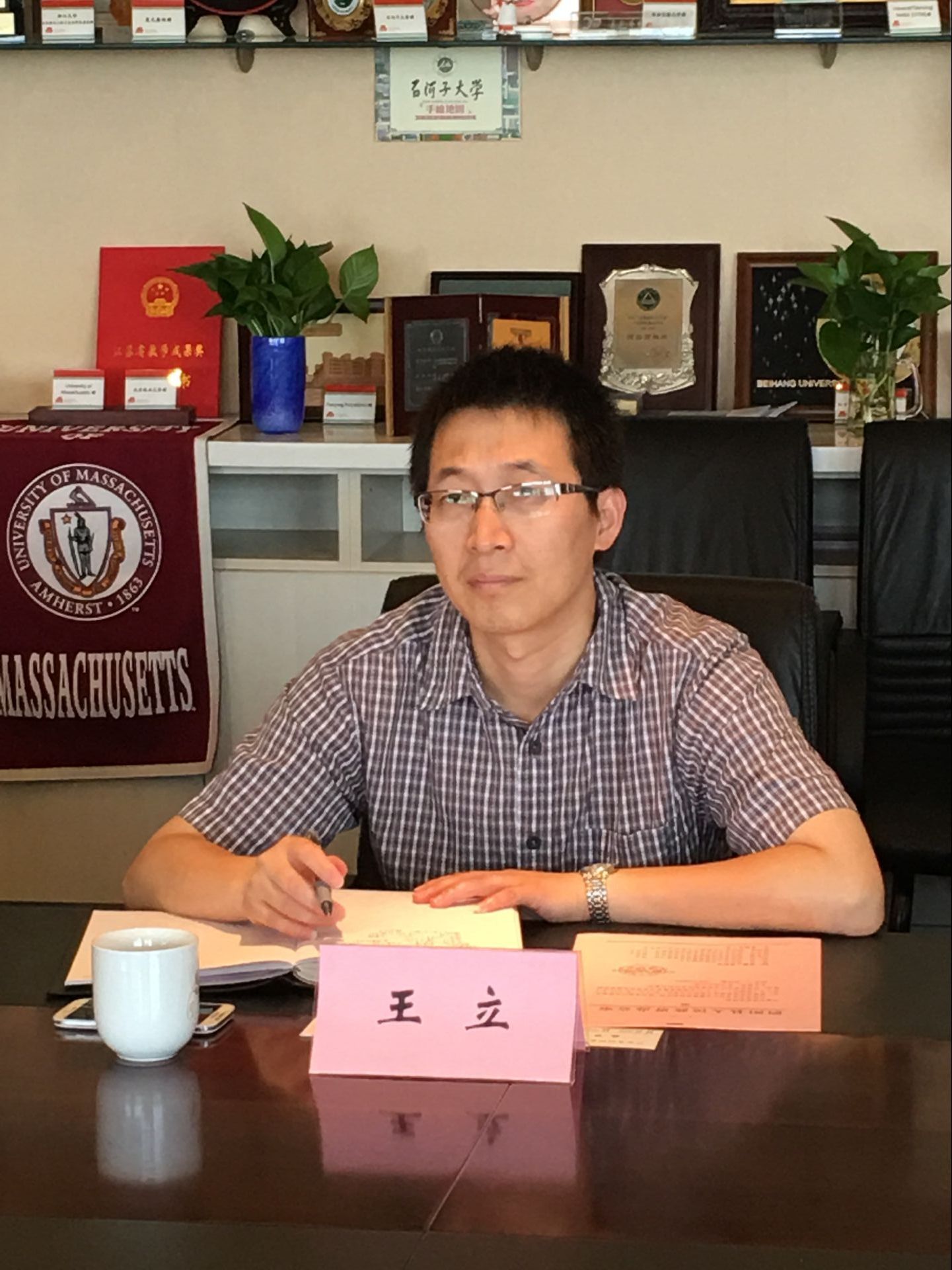 泗阳县人民政府副县长魏国一行来食品学院交流
